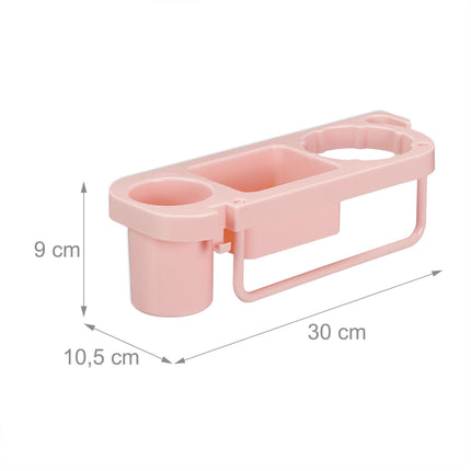 Hair dryer holder for the wall