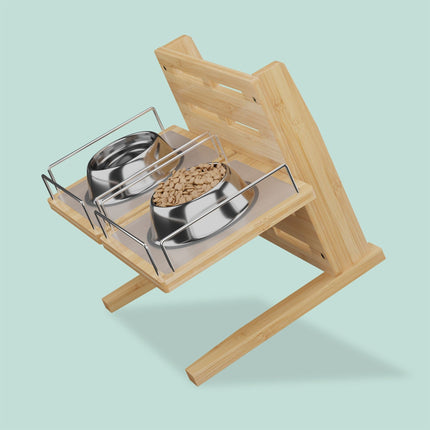 Height-adjustable feeding station for dogs