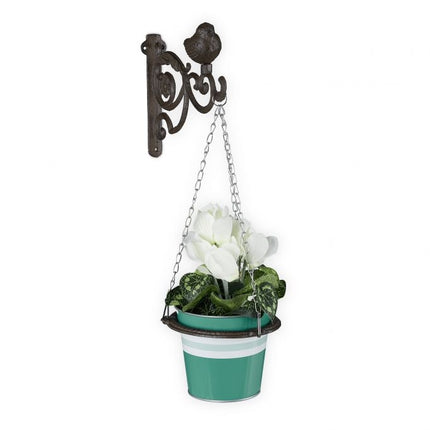 Holder for hanging flower basket on the wall