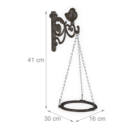 Holder for hanging flower basket on the wall