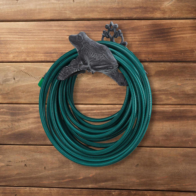 Hose holder in cast iron with frog motif
