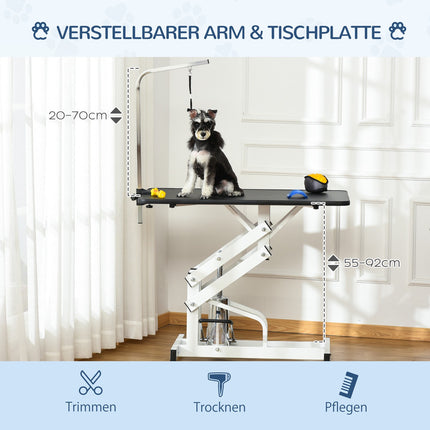 Hydraulic dog grooming table with cutting arm
