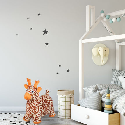 Jumping animal giraffe with cap