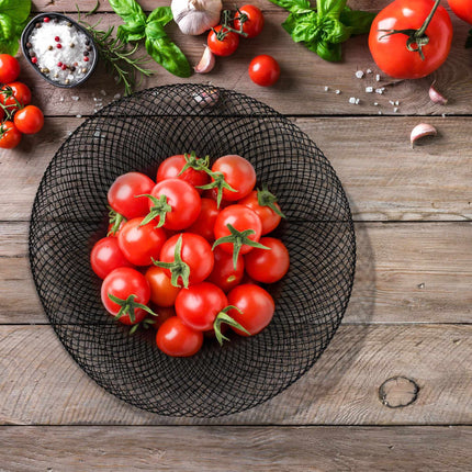 Metal fruit bowl with double walls