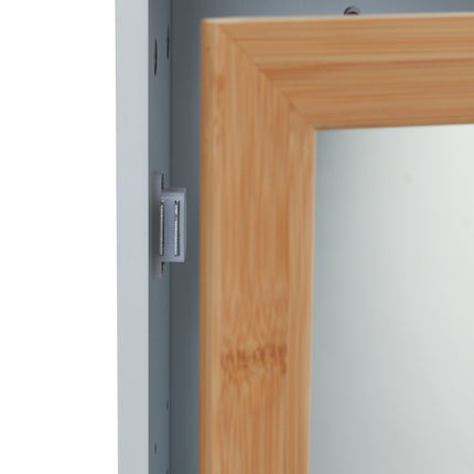 Mirror cabinet with towel holder