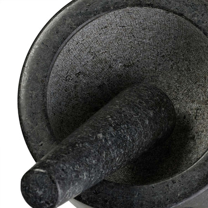 Mortar with impact and wooden underlay