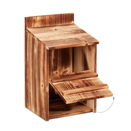 Nesting box for birds that nest in semi-cavities