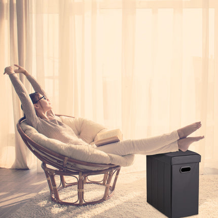 Ottoman in black artificial leather