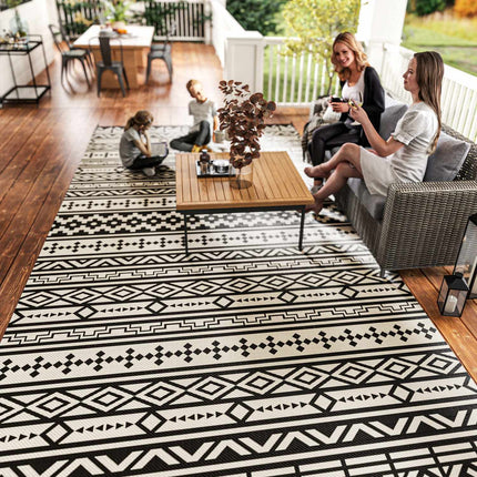 Buitentapijt, robuust weerbestendig buitentapijt, opvouwbaar tapijt in boho-stijl, buitentapijt voor woonkamer, balkon, tuin, terras, badkamer, hal, keuken, 548 x 274 cm zwart + wit Aosoom
