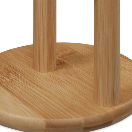 Paper towel holder with roll-off stop