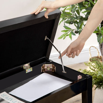 Height-adjustable black piano bench with storage, 75x35x49 cm