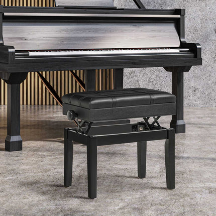 Height-adjustable piano bench in black leather with storage