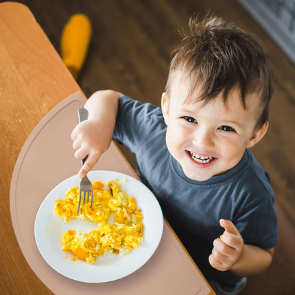 Placemat for children in a semi-circular shape