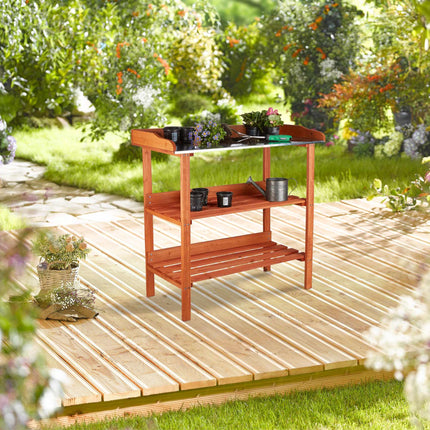 Planter table with metal plate