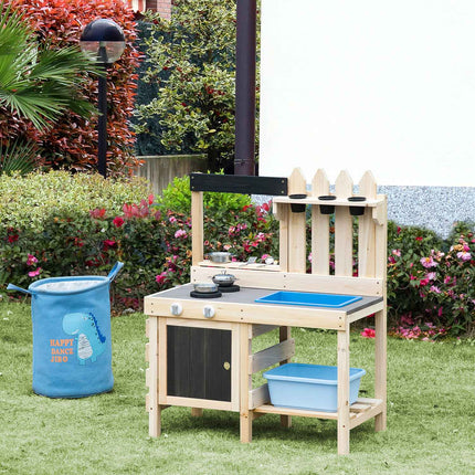 Wooden play kitchen with pots and tools in stainless steel
