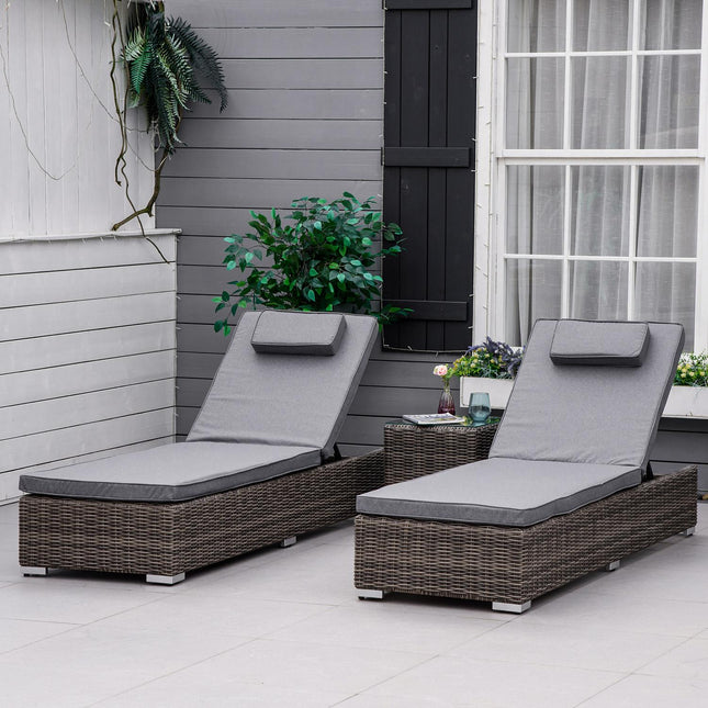 Adjustable sun lounger in poly rattan with table and cushion
