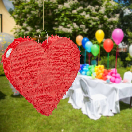 Red heart shaped pinata