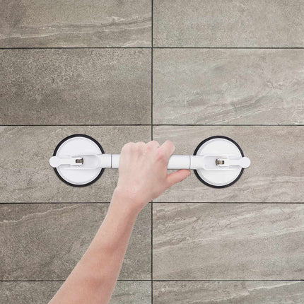Retractable suction handle