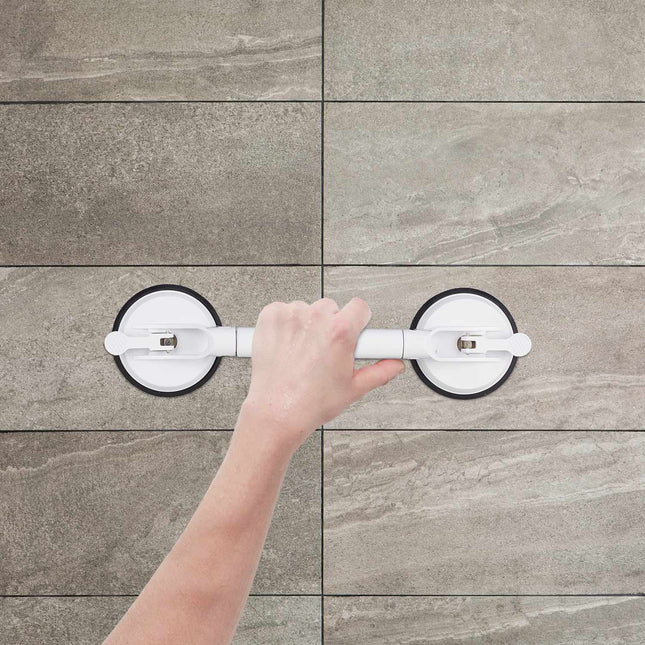 Retractable suction handle