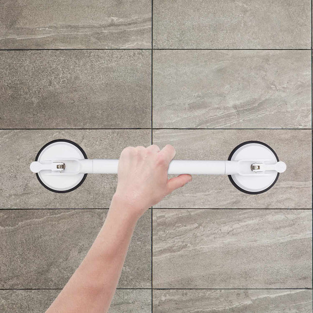 Retractable suction handle