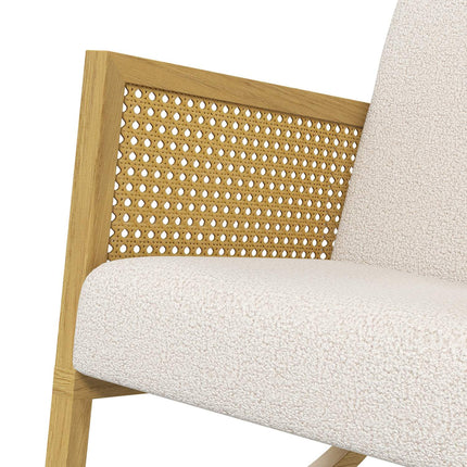 Rocking chair with soft cushions and rattan decor