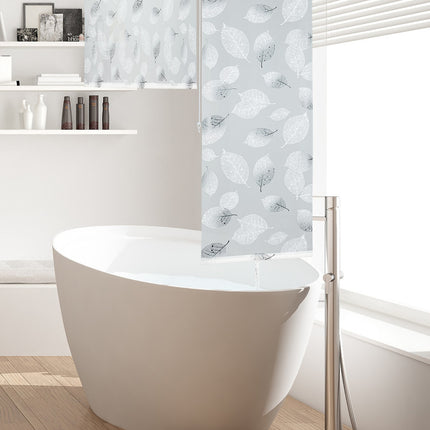 Roller blind for shower with leaf design