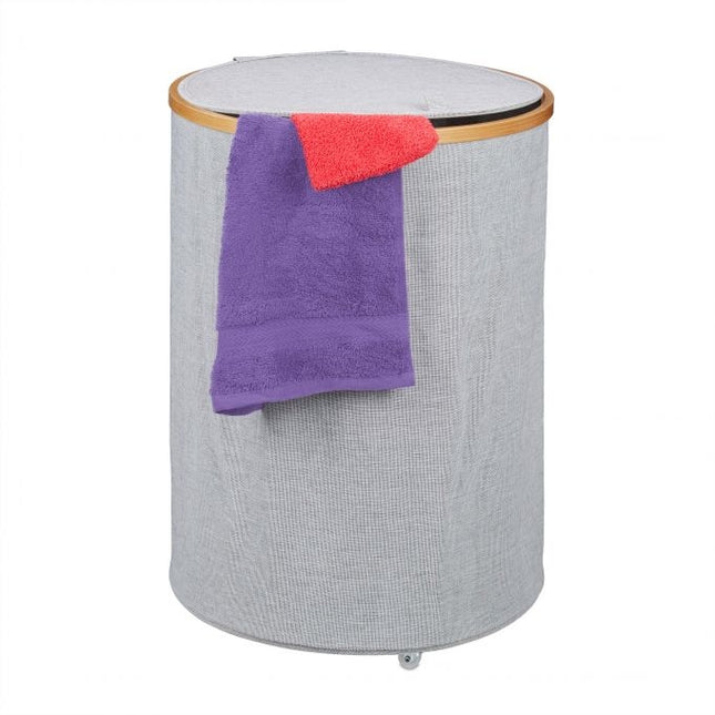 Ronde wasmand van stof en bamboe