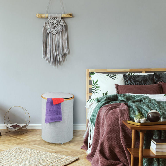 Ronde wasmand van stof en bamboe