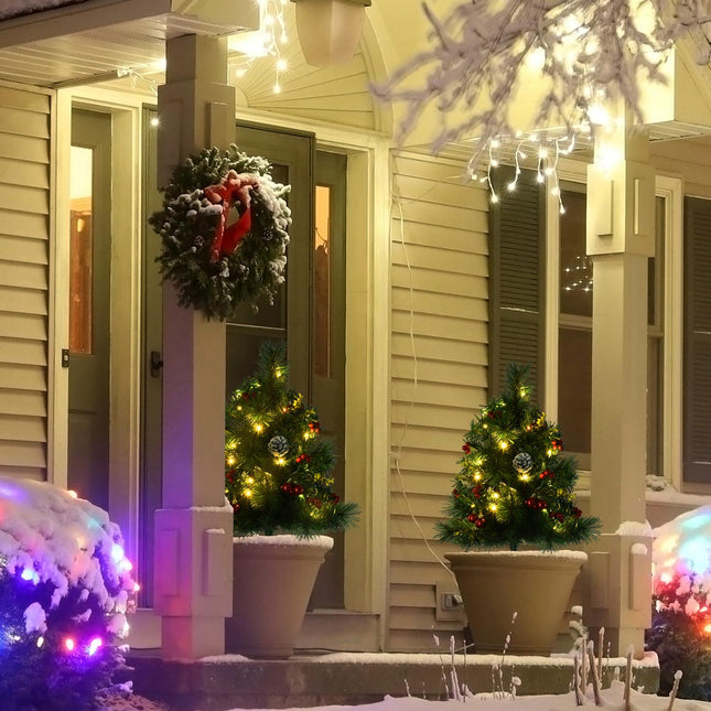 Set of 2 mini Christmas trees with cones and LED lights