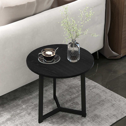 Round coffee table with steel frame - modern black design