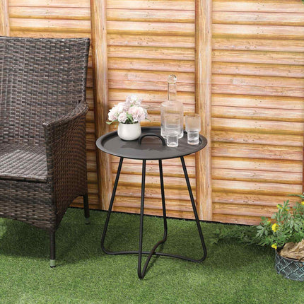Round black metal side table with carrying handle