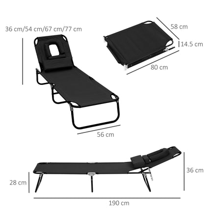 Black sun lounger with face opening for relaxation
