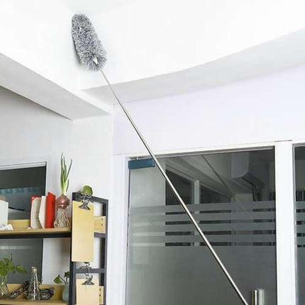 Telescopic dust brush with two attachments