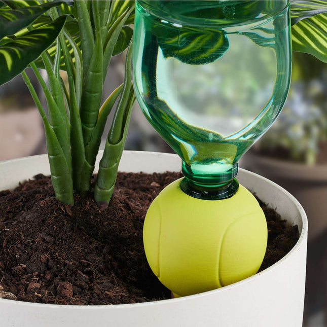 Tennis ball in clay cone with 4 sets