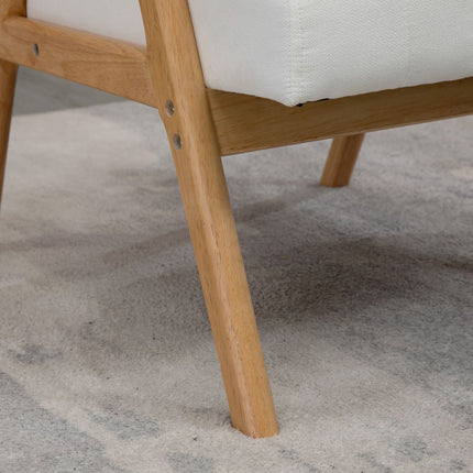 Scandi upholstered lounge chair in velvet look with armrests