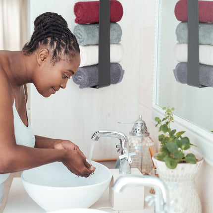 Wall-mounted towel rail