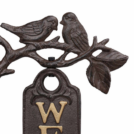 Welcome sign with birds
