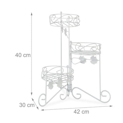 White flower pedestal in metal