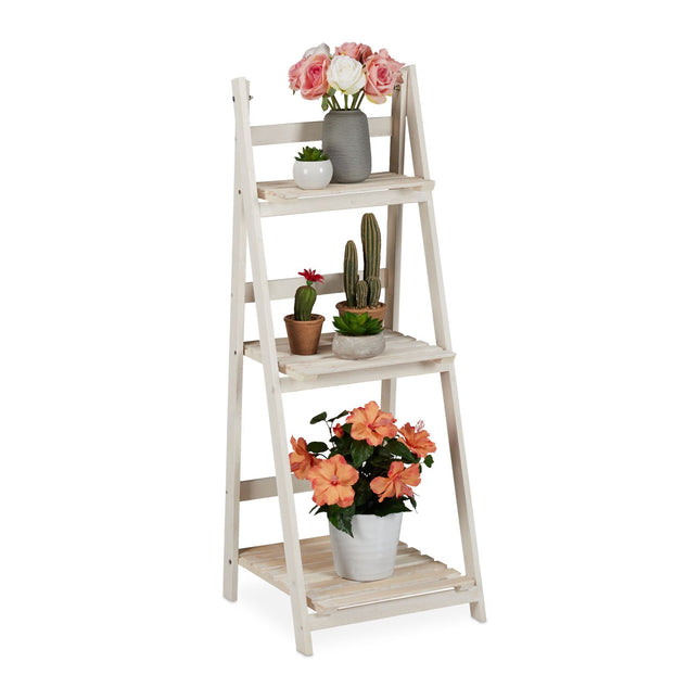 White stairs with wooden flowers