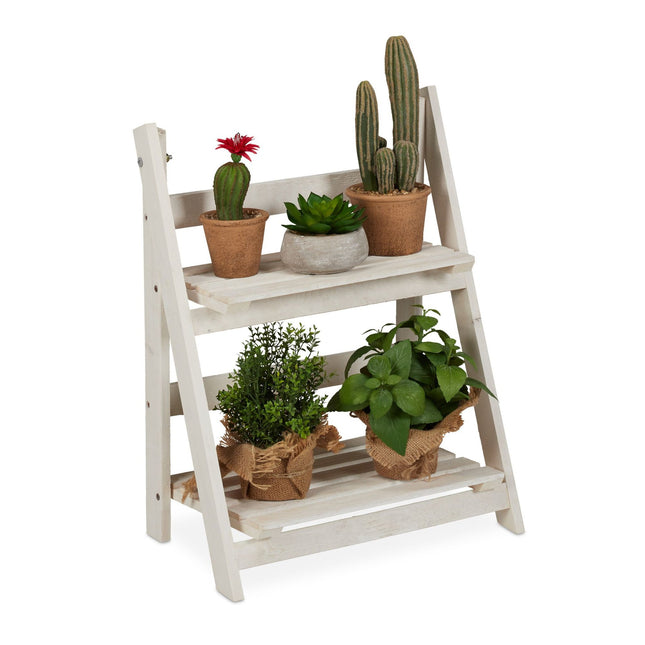 White stairs with wooden flowers