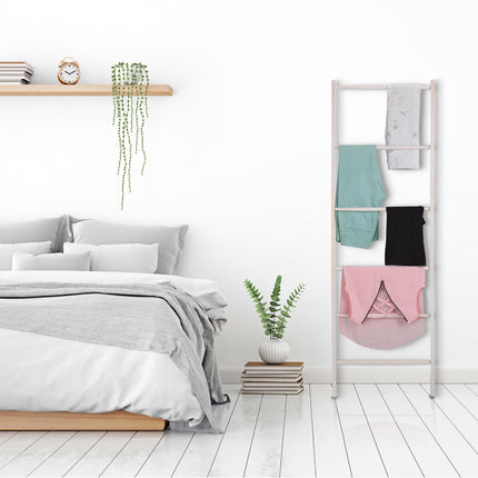 White towel rack with 6 pegs