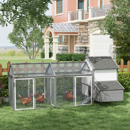 Gray wooden chicken house with nesting box and ramp