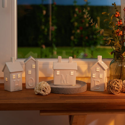 set of 4 ceramic "Home" heat candle holders